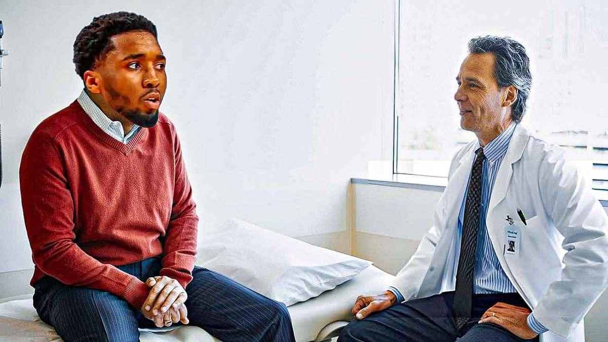 Donovan Mitchell (Cavs) talking to a doctor