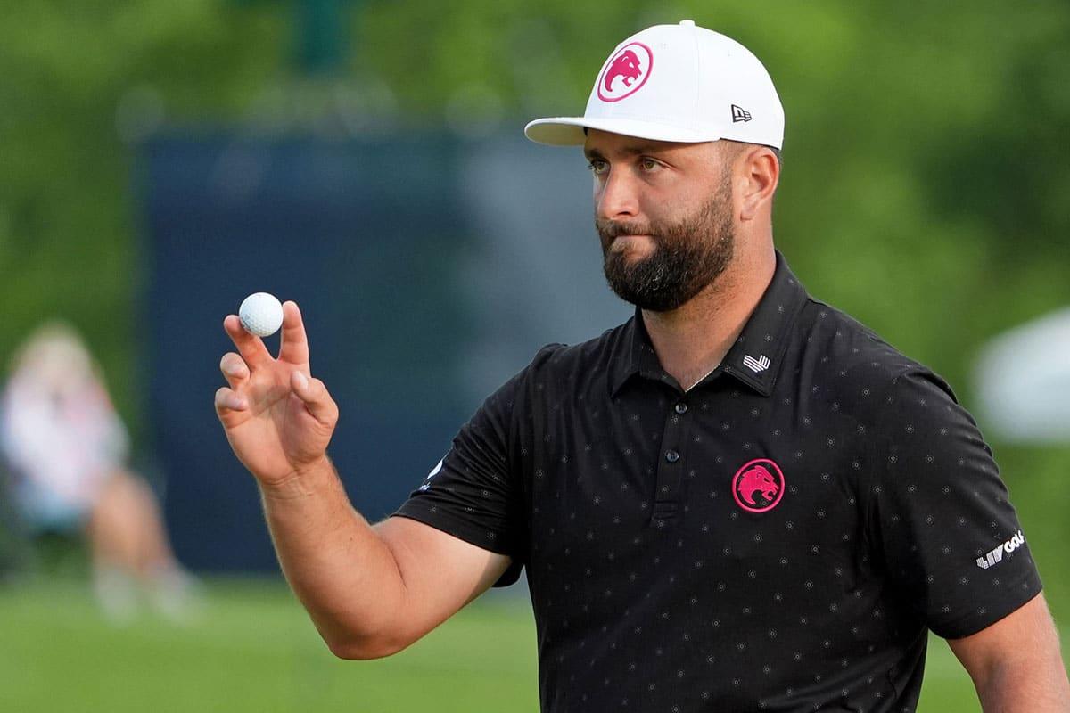 Jon Rahm reacts after a putt on the 18th green during the first round of the PGA Championship golf tournament at Valhalla Golf Club.