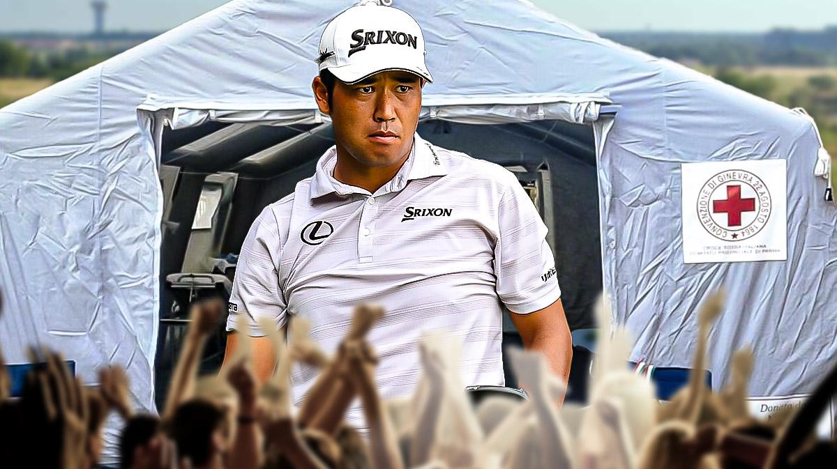 hideki matsuyama in front of medical tent