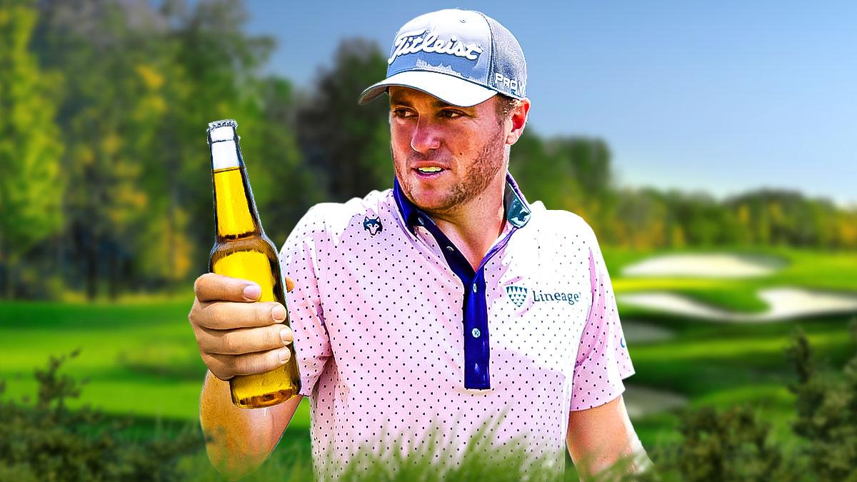 justin thomas holding a beer