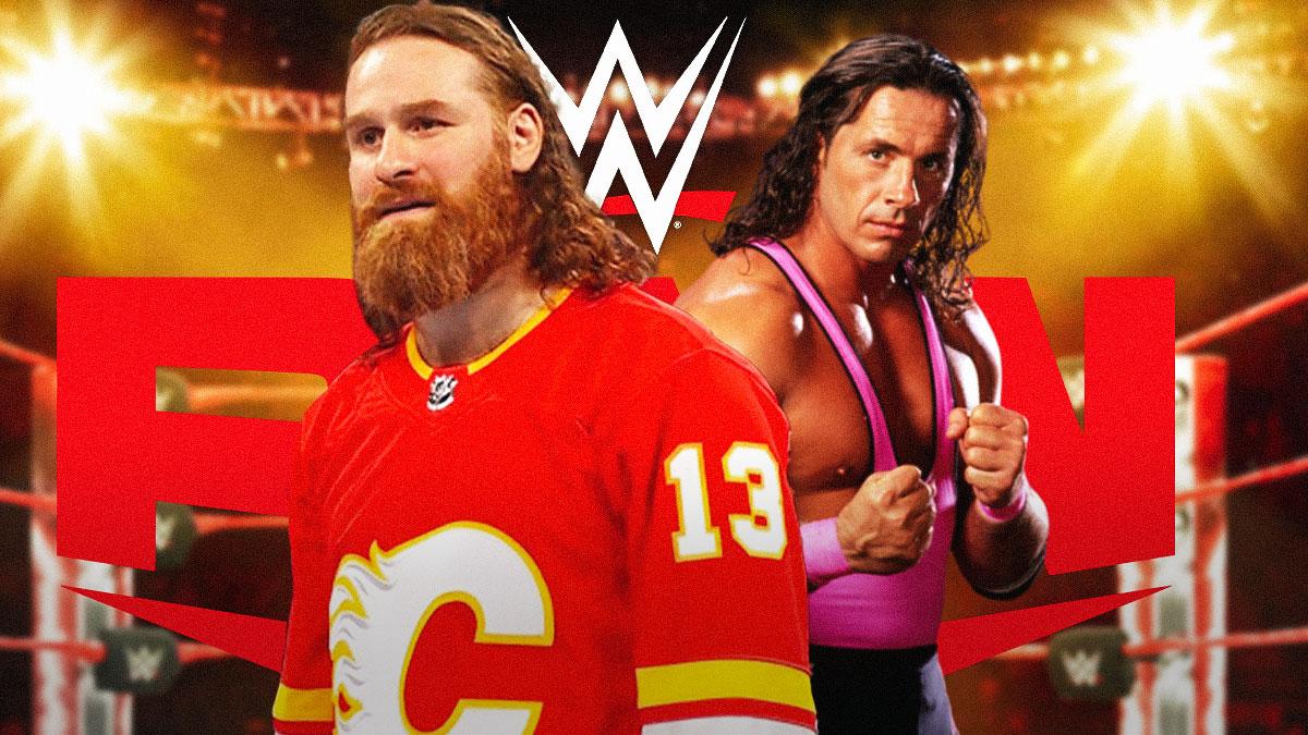 Sami Zayn wearing a Johnny Gaudreau Flames jersey next to Bret Hart with the RAW logo as the background.