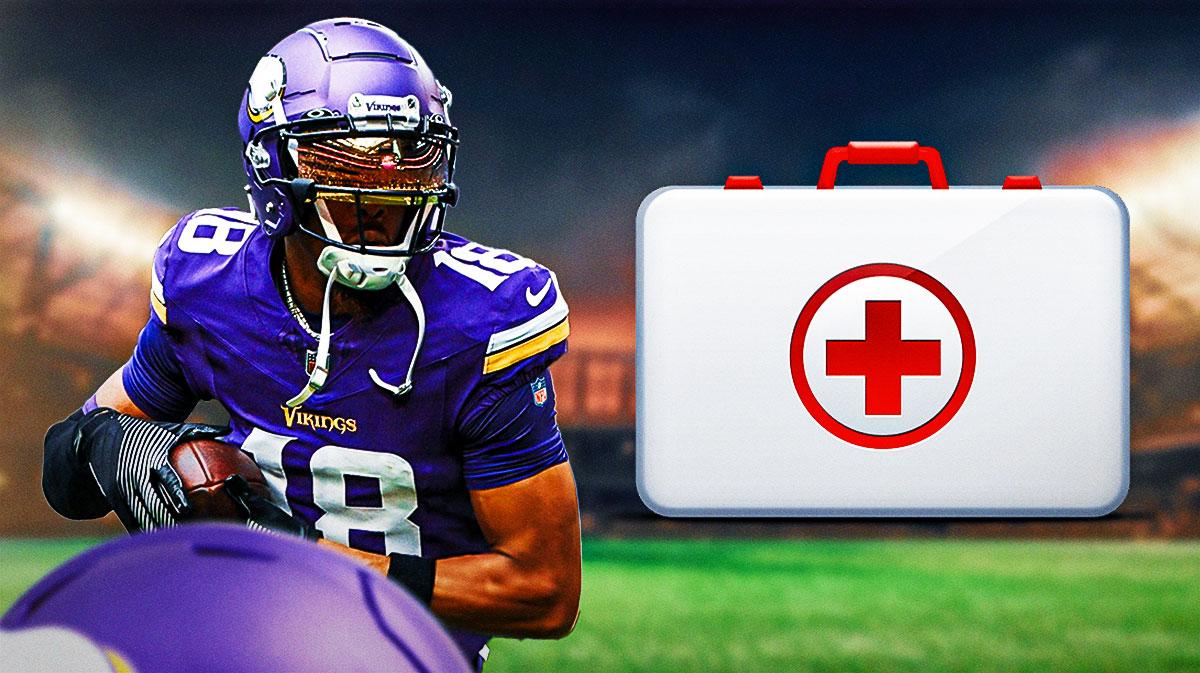 Justin Jefferson with a first aid kit near him.