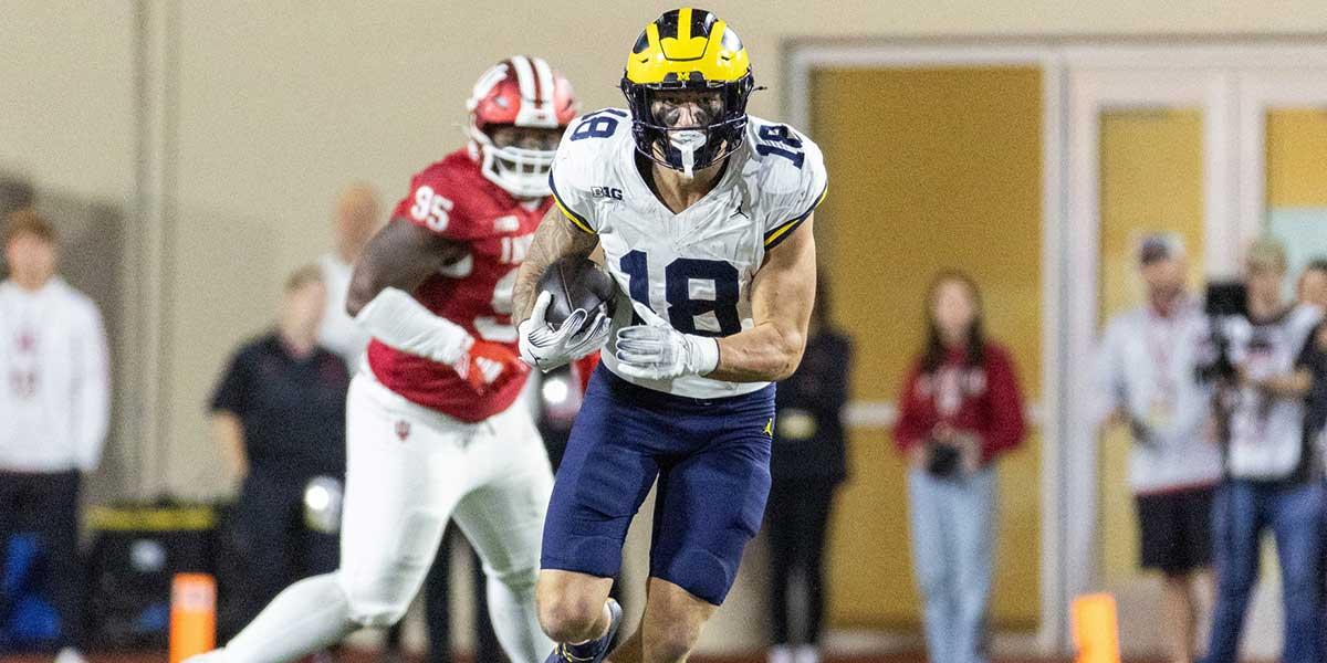 Michigan Wolverines tight end Colston Loveland (18) runs with the ball in the second half against the Indiana Hoosiers at Memorial Stadium.