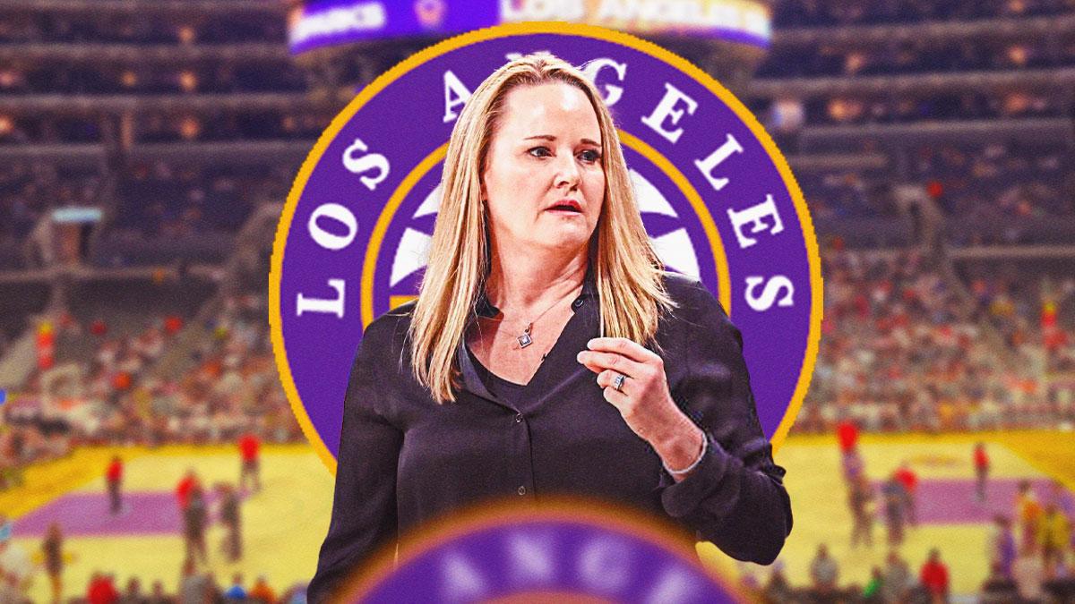 College basketball coach Lynne Roberts with the Los Angeles Sparks logo in the background, head coach