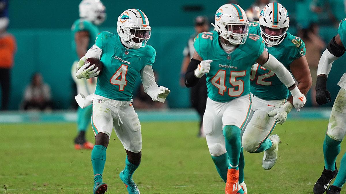 Miami Dolphins cornerback Kader Kohou (4) runs with the ball after intercepting a pass from San Francisco 49ers quarterback Brock Purdy (13, not pictured) during second half at Hard Rock Stadium.