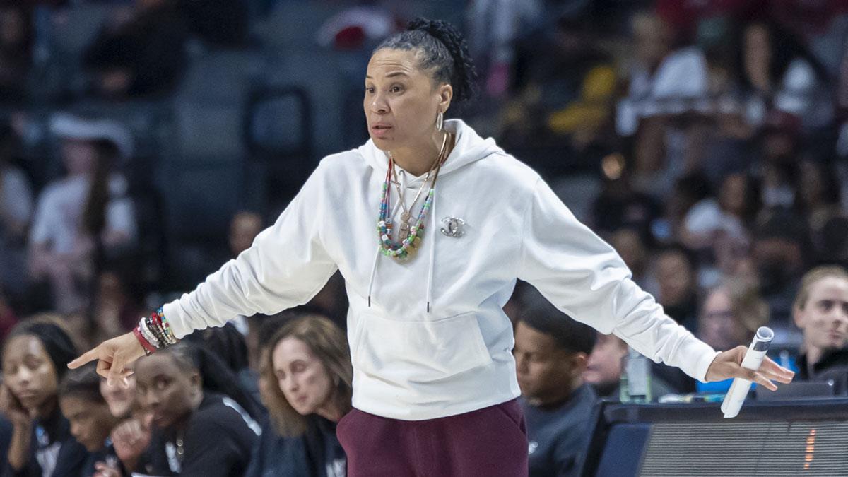 South Carolina Gamecocks head coach Dawn Staley signals to her team during the first half of an Elite 8 NCAA Tournament basketball game against the Duke Blue Devils at Legacy Arena.