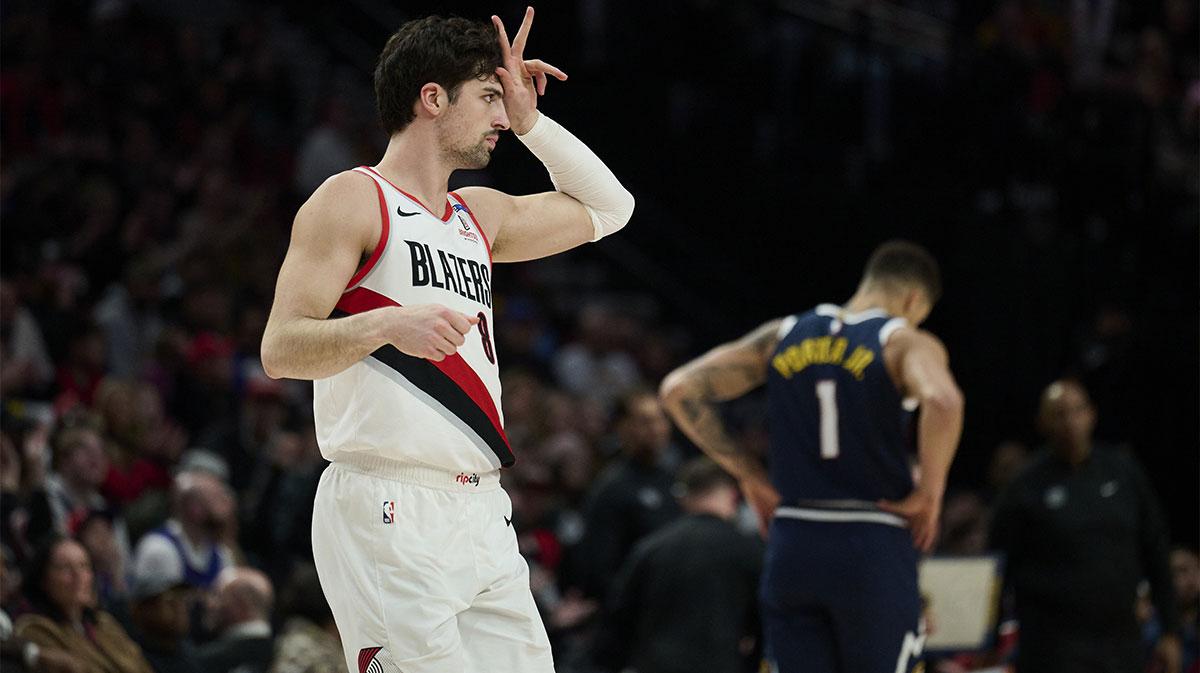 Portland Trail Blazers forward Deni Avdija (8) celebrates scoring a three point basket during the second half against the Denver Nuggets at Moda Center.