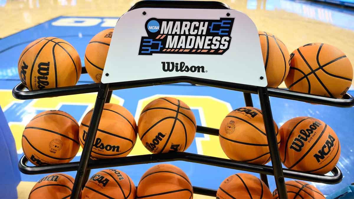 A rack of basketballs with the March Madness logo before that start of the UCLA Bruins - Ohio State Buckeyes game at Pauley Pavilion presented by Wescom.