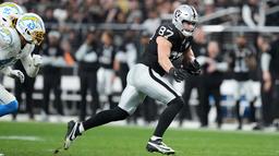 Jan 5, 2025; Paradise, Nevada, USA; Las Vegas Raiders tight end Michael Mayer (87) carries the ball against the Los Angeles Chargers in the second half at Allegiant Stadium. Mandatory Credit: Kirby Lee-Imagn Images