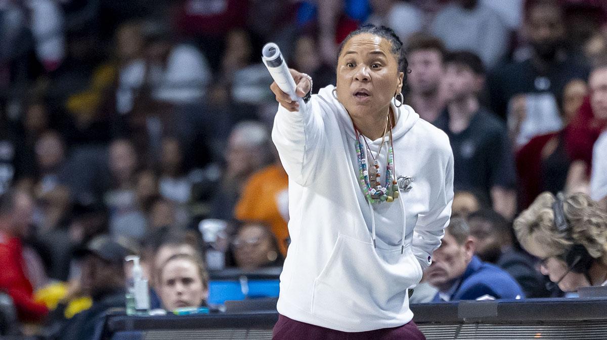 South Carolina Gamecocks head coach Dawn Staley signals to her team during the second half of an Elite 8 NCAA Tournament basketball game against the Duke Blue Devils at Legacy Arena.