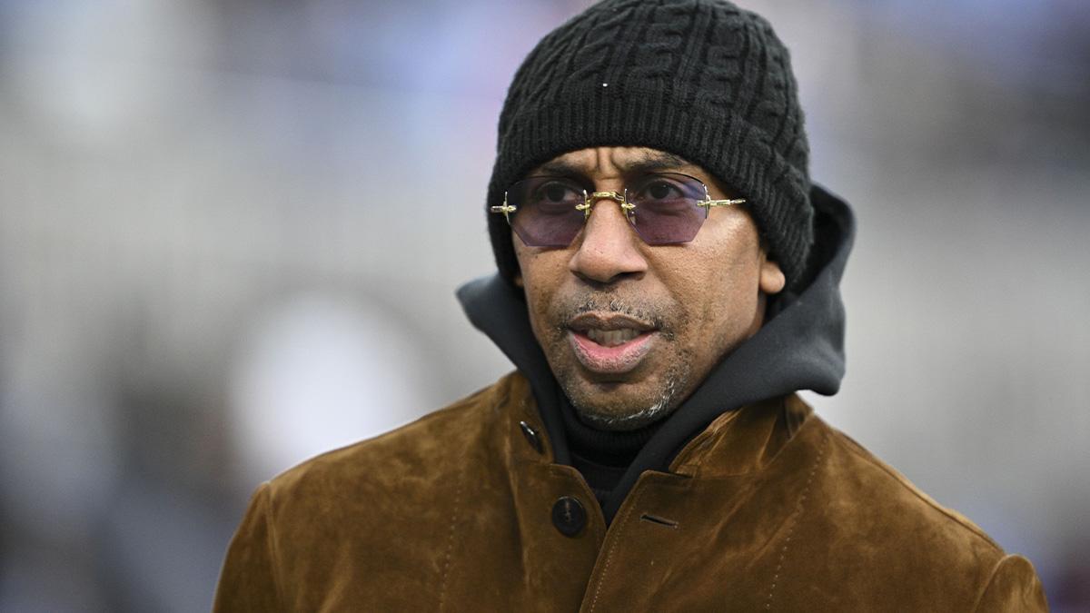 Stephen A. Smith , American sports television personality, walks on the field before the game between the Baltimore Ravens and the Pittsburgh Steelers at M&T Bank Stadium