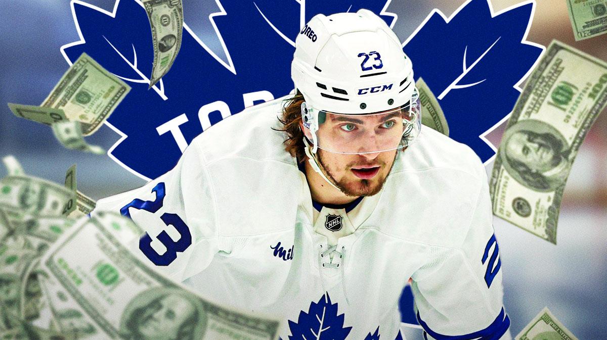 Matthew Knies with money around him and Maple LEafs logo in the background.