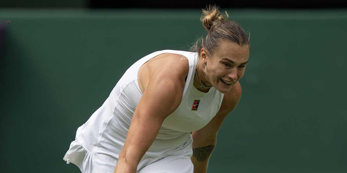 Jul 2, 2025; Wimbledon, United Kingdom; Aryna Sabalenka returns a shot during her match against Marie Bouzkova of the Czech Republic on day three at the All England Lawn Tennis and Croquet Club. Mandatory Credit: Susan Mullane-Imagn Images