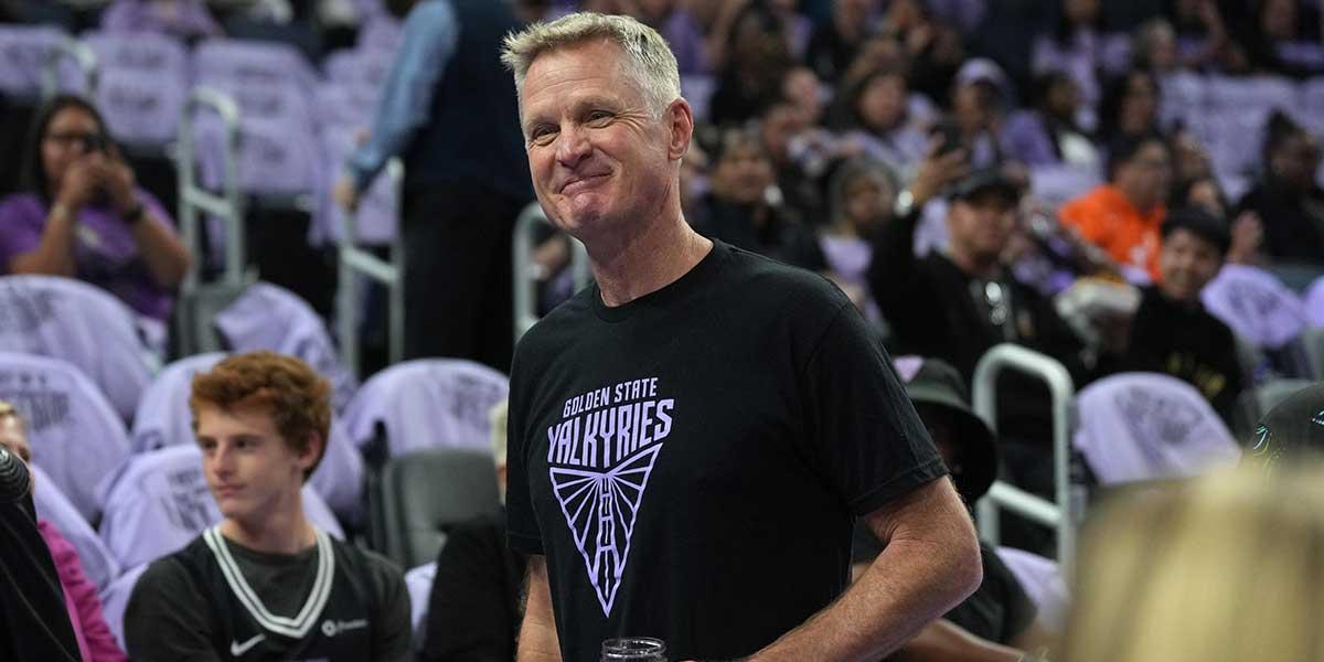 Golden State Warriors head coach Steve Kerr walks along the court before the game between the Golden State Valkyries and the Los Angeles Sparks at Chase Center.