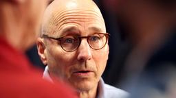 New York Yankees general manager Brian Cashman talks with the media before the game between the Yankees and the Washington Nationals at Yankee Stadium.