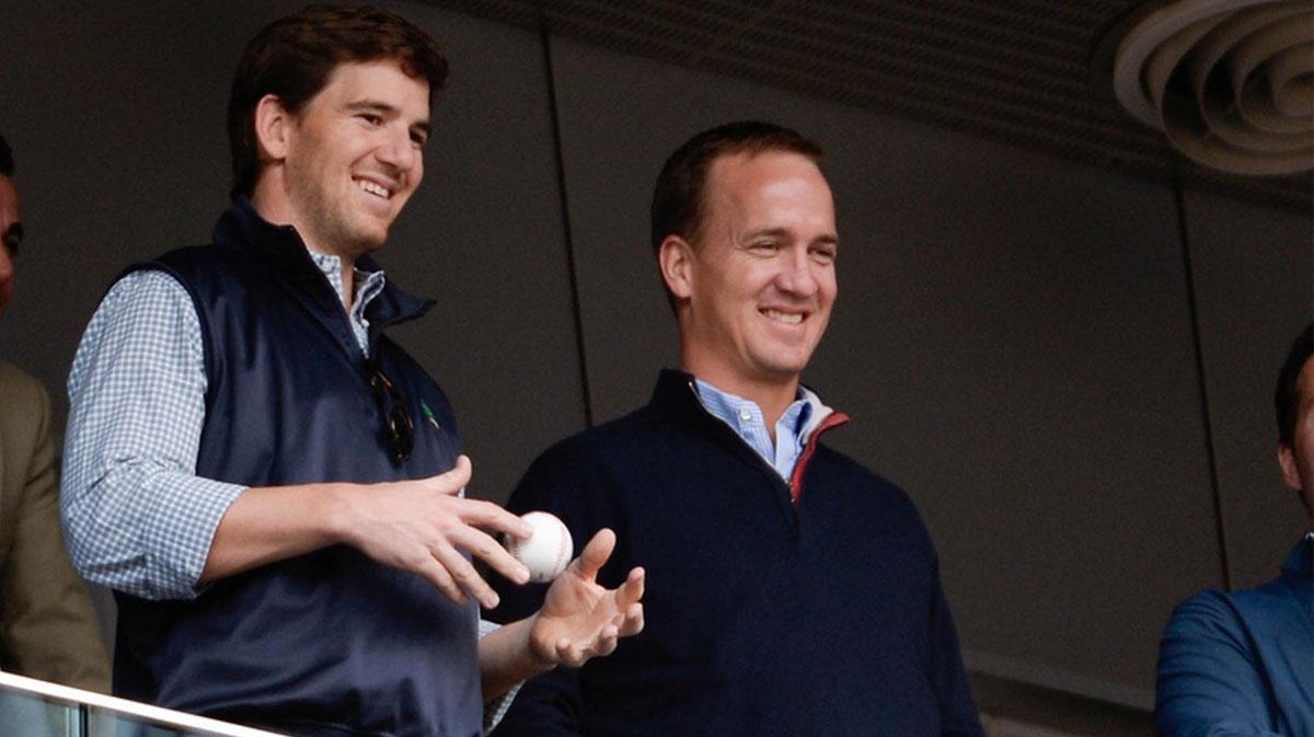 Eli and Peyton Manning at Yankee Stadium.