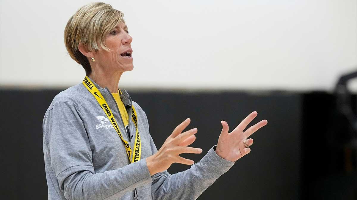 Iowa head coach Jan Jensen speaks to her team during a women’s basketball practice July 22, 2025 at Carver-Hawkeye Arena in Iowa City, Iowa.