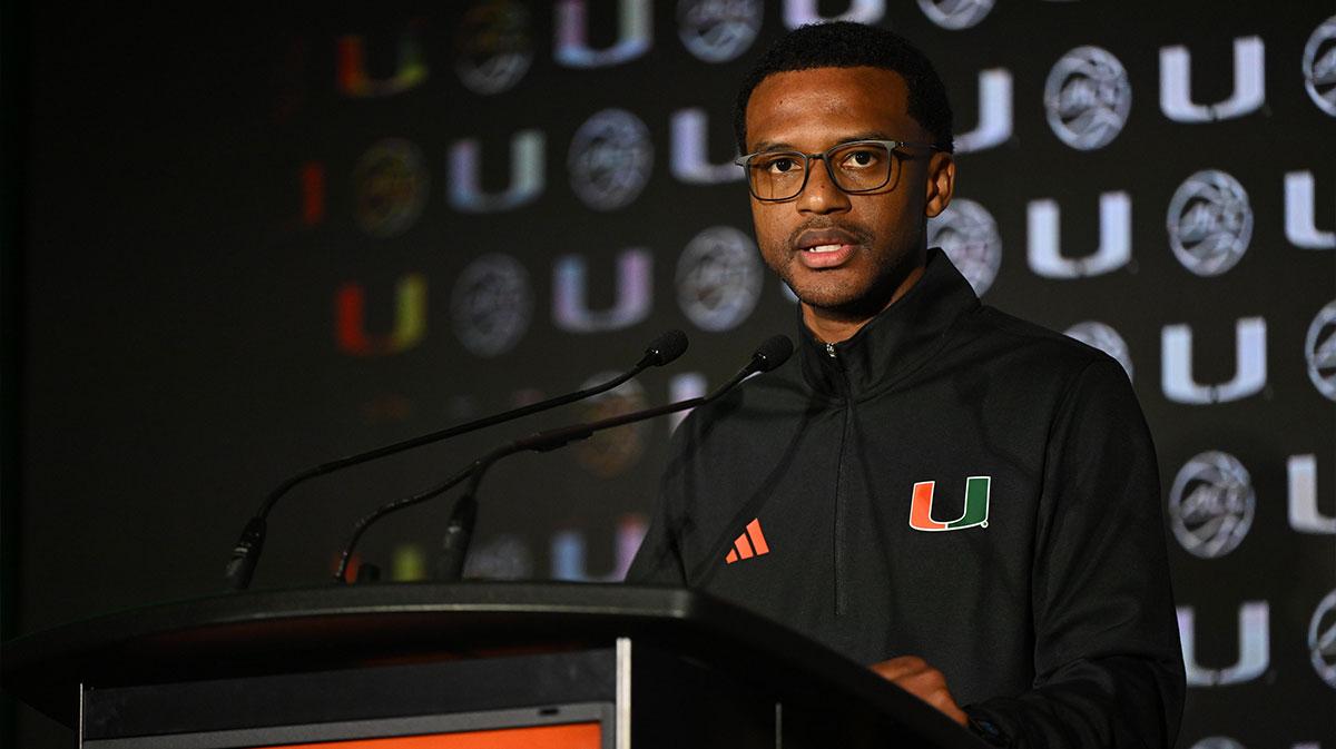 Miami head coach Jai Lucas answers questions from the media at The Hilton Charlotte Uptown.