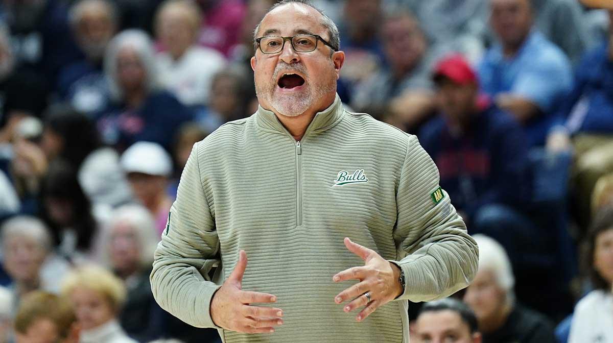 South Florida Bulls head coach Jose Fernandez watches from the sideline as they take on the UConn Huskies at Harry A. Gampel Pavilion.
