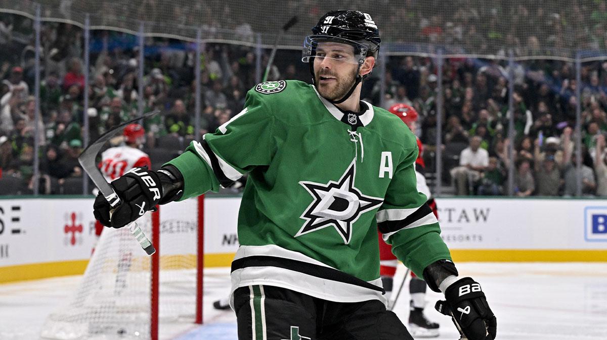 Dallas Stars center Tyler Seguin (91) celebrates a goal scored by defenseman Miro Heiskanen (not pictured) against the Carolina Hurricanes during the second period at the American Airlines Center.
