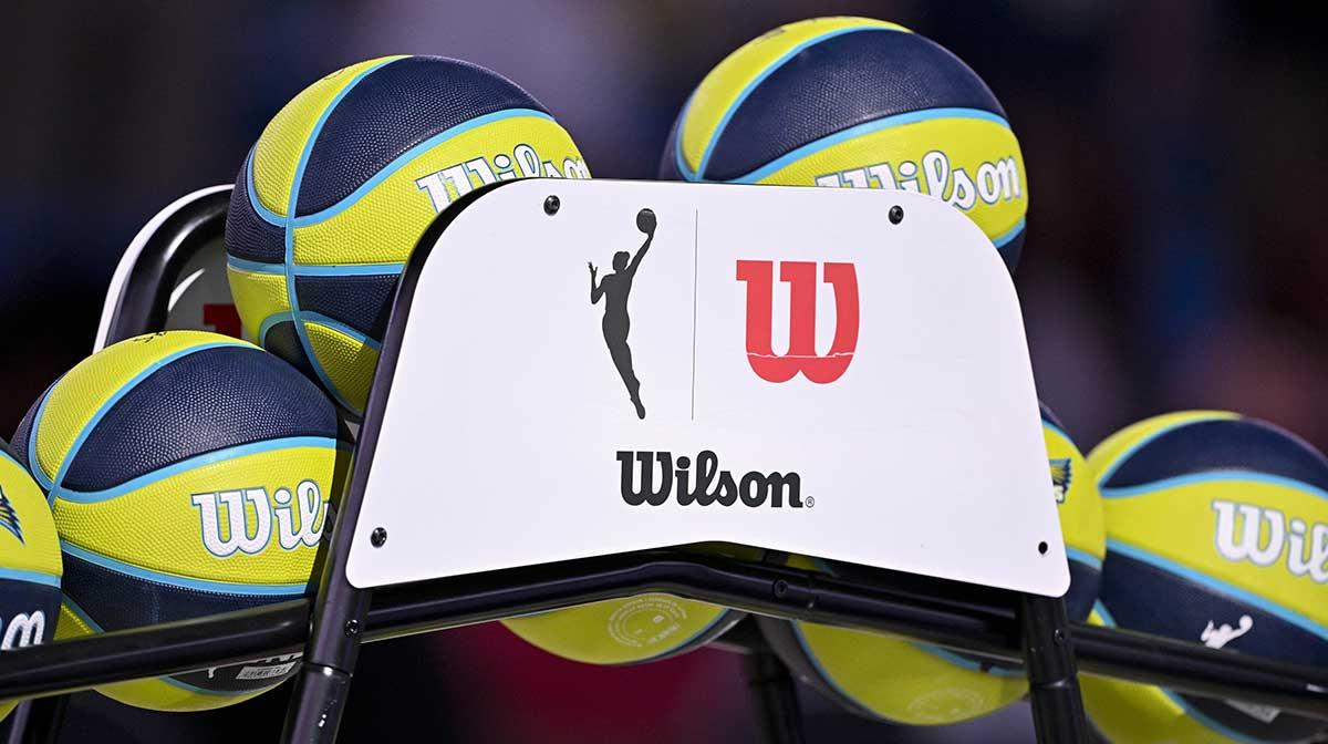 A view of the Wilson logo and WNBA logo and basketballs before the game between the Dallas Wings and the New York Liberty at College Park Center.