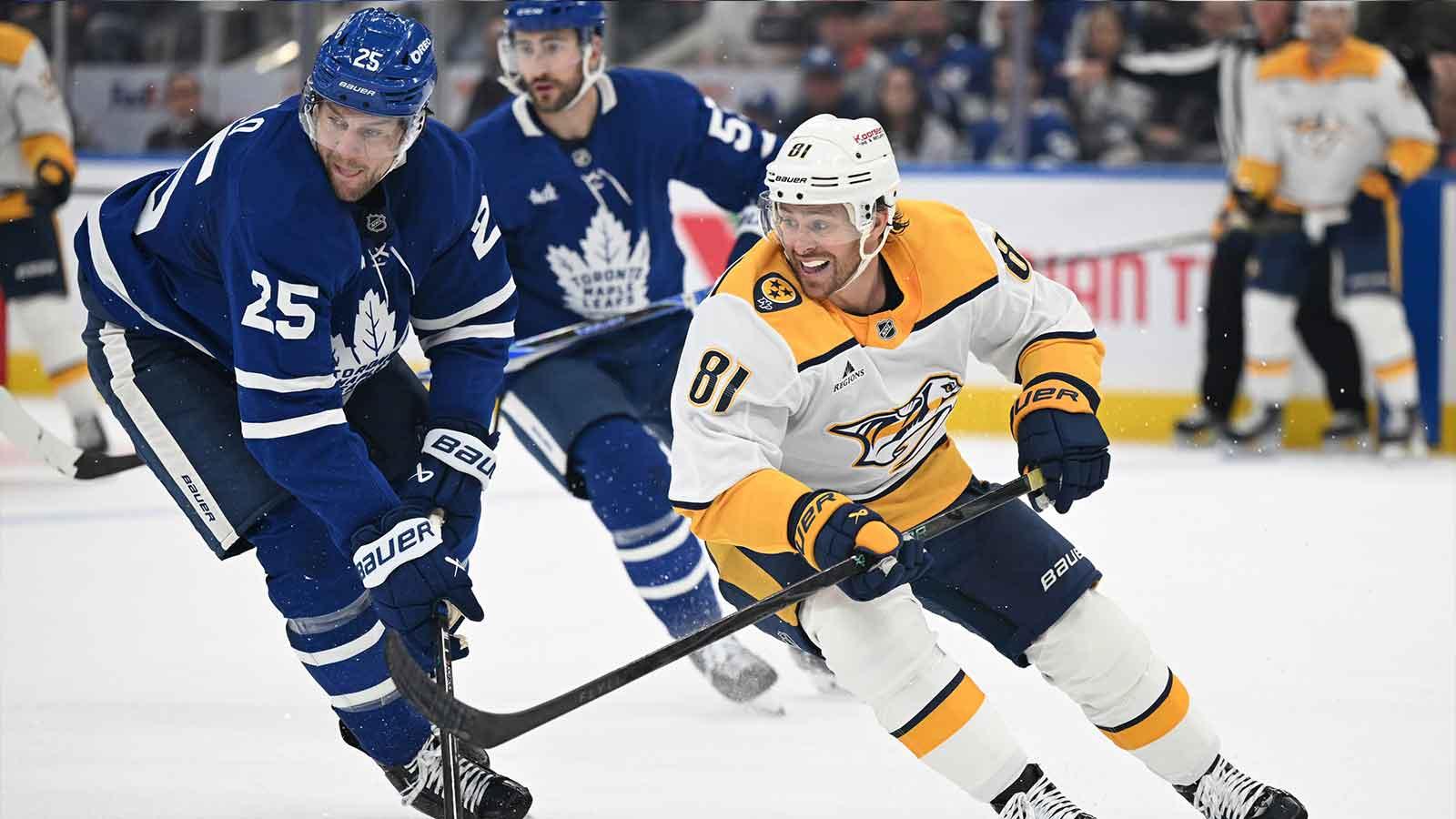 Nashville Predators forward Jonathan Marchessault (81) skates past Toronto Maple Leafs defenseman Brandon Carlo (25) in the second period at Scotiabank Arena.