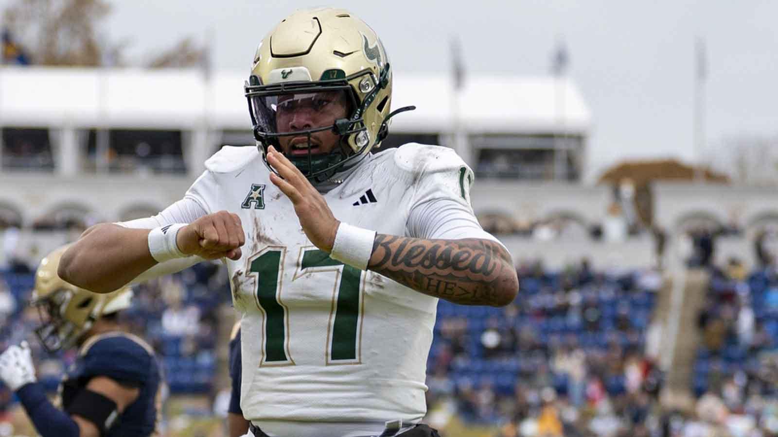 South Florida Bulls quarterback Byrum Brown (17) reacts after scoring a touchdown against the Navy Midshipmen during the second half at Navy-Marine Corps Memorial Stadium. Navy Midshipmen defeated South Florida Bulls 41-28.