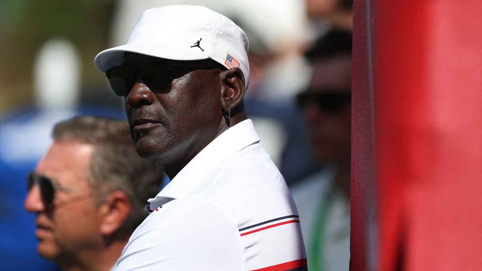 Former basketball player Michael Jordan watches during the four-balls on the first day of competition for the Ryder Cup at Bethpage Black.