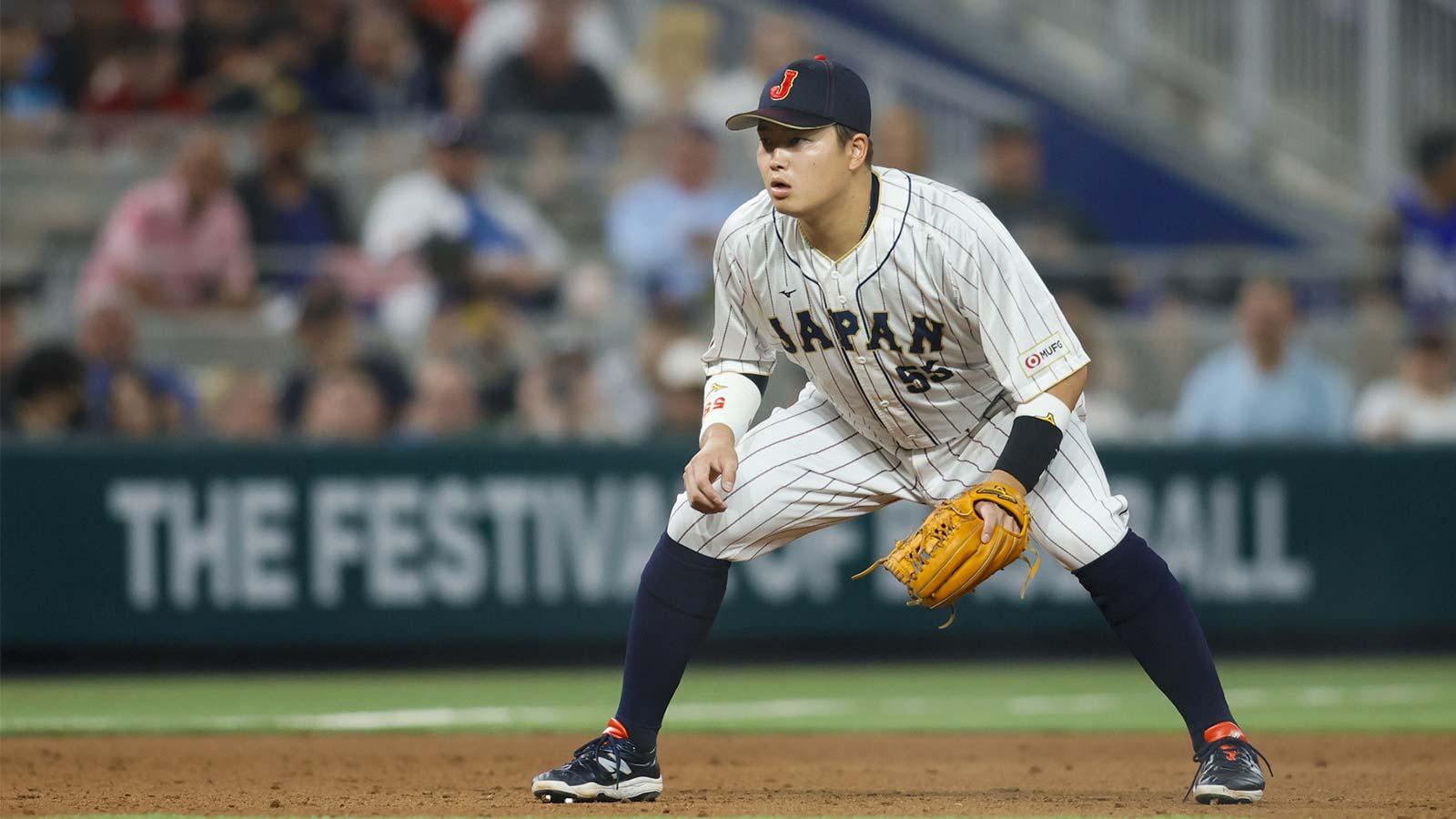 Japan third baseman Munetaka Murakami (55) plays his position during the sixth inning against the USA at LoanDepot Park.