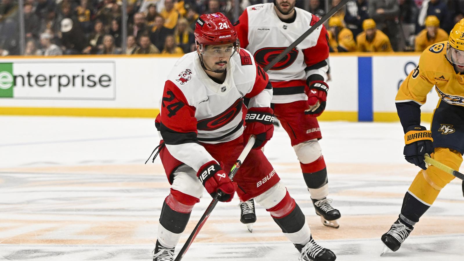 Carolina Hurricanes center Seth Jarvis (24) skates with the puck against the Nashville Predators during the second period at Bridgestone Arena.