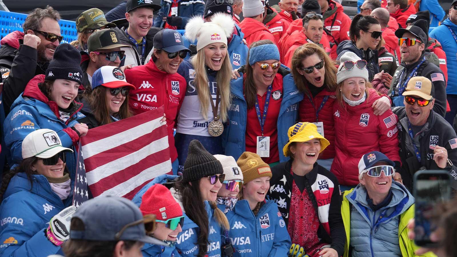 Lindsey Vonn of the United States celebrates with the Team USA ski team after placing second in the Super G alpine skiing race in the 2025 FIS Ski World Cup at Sun Valley.