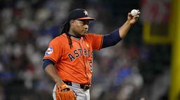 Houston Astros starting pitcher Framber Valdez (59) motions for a new ball during the sixth inning against the Texas Rangers at Globe Life Field.
