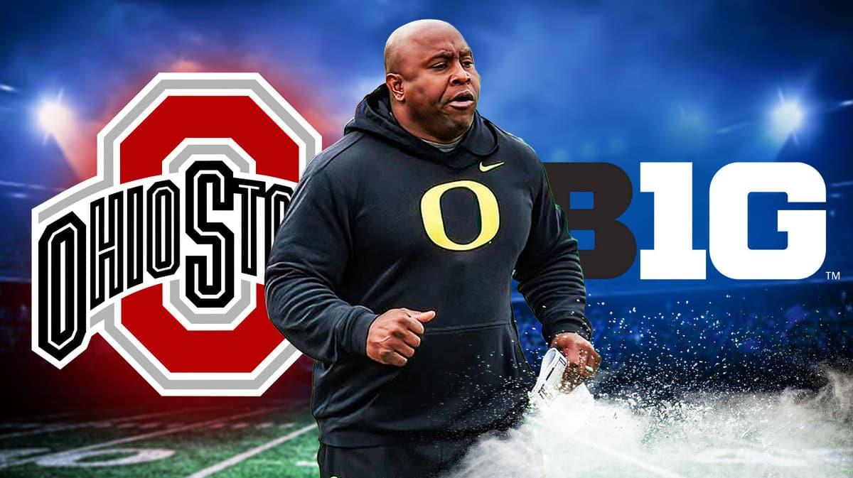 Ex-Ducks coach Carlos Locklyn stands next to Ohio State, Big Ten logo