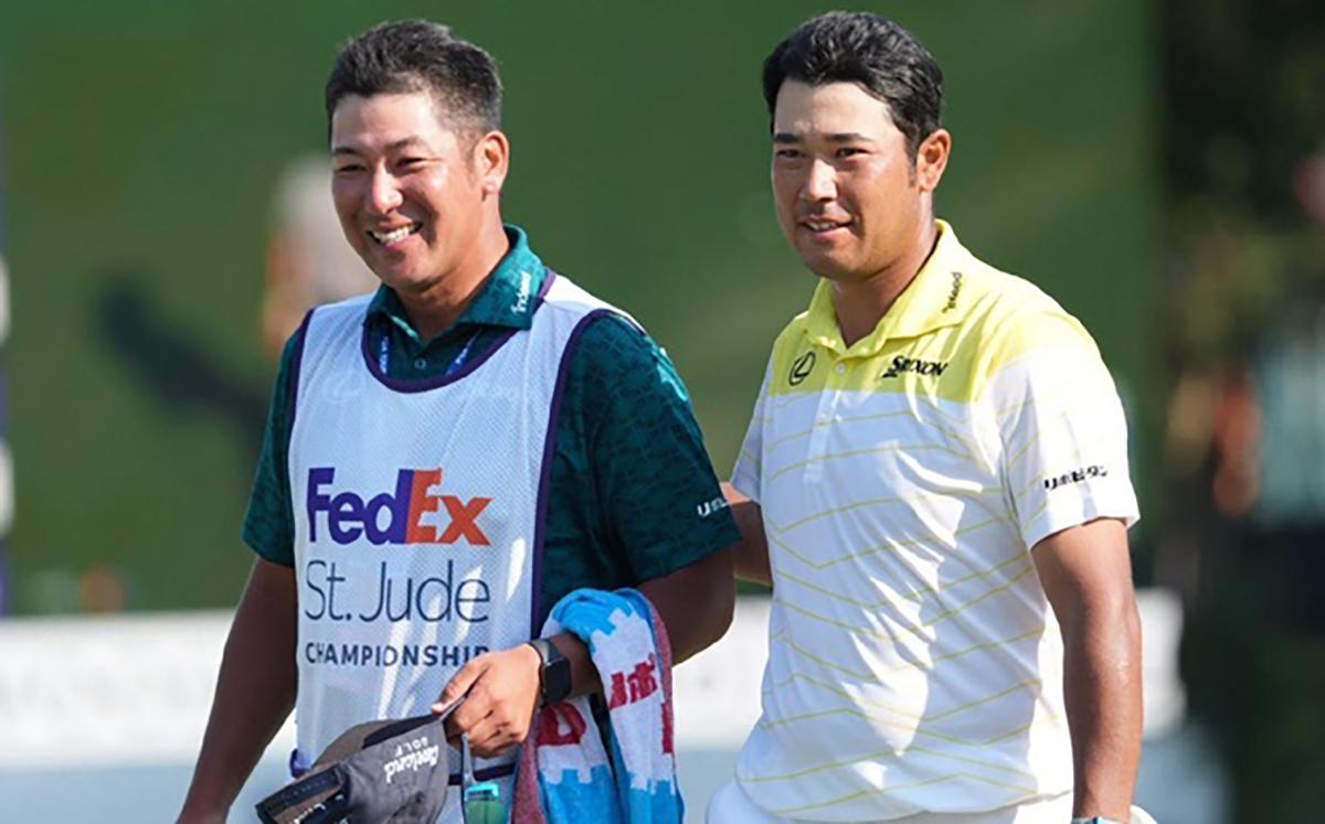Hideki Matsuyama, right, and caddie Taiga Tabuchi react after winning the FedEx St. Jude Championship Sunday at TPC Southwind