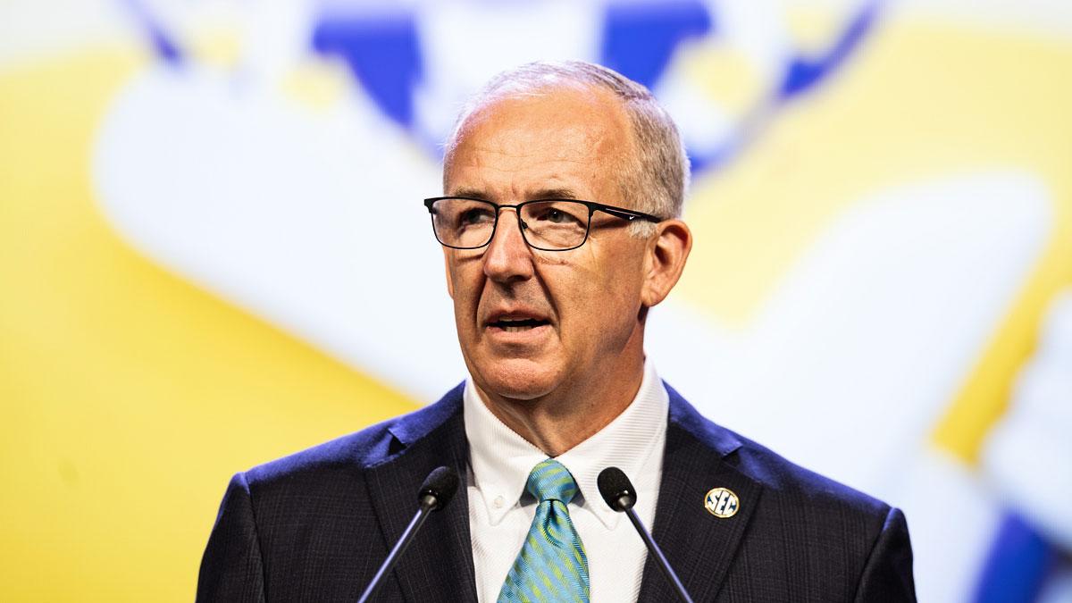 SEC commissioner Greg Sankey speaking at Omni Dallas Hotel.