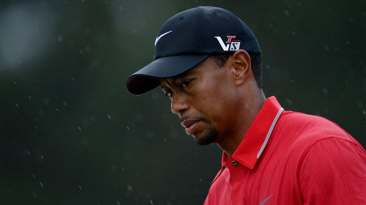 Tiger Woods walks to the 18th green during the final round of the 2013 The Masters golf tournament at Augusta National Golf Club.