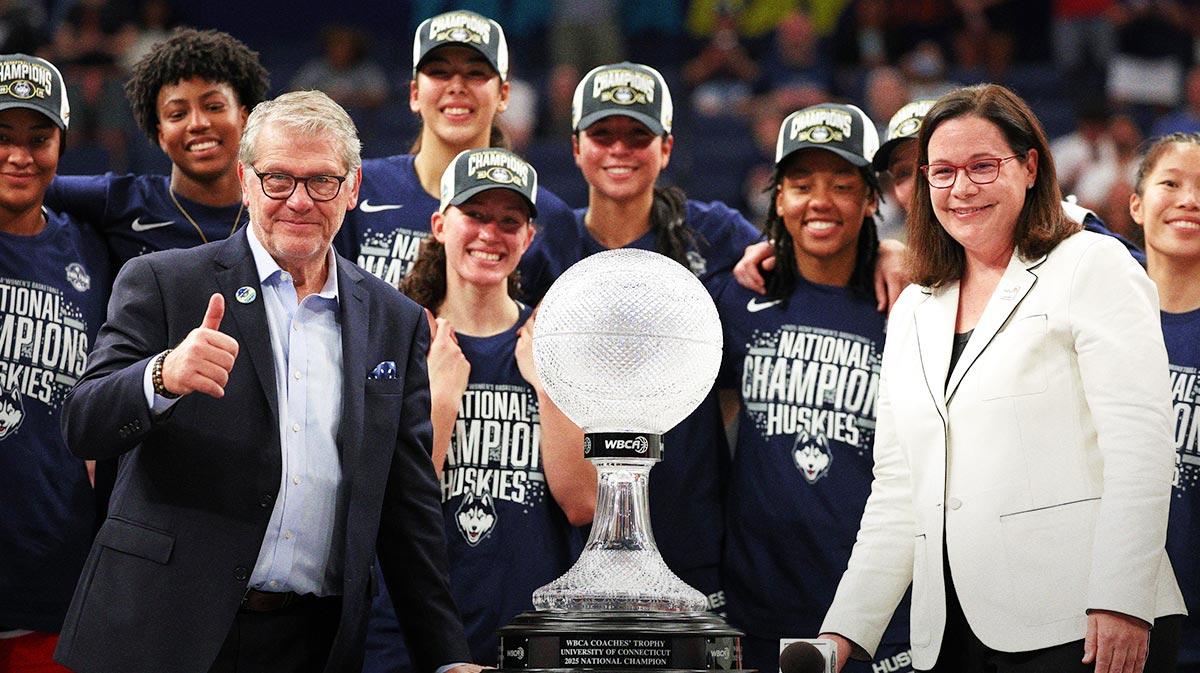 UConn women's basketball head coach Geno Auriemma receives the WBCA Coaches’ trophy after the national championship of the women's 2025 NCAA tournament against the South Carolina Gamecocks at Amalie Arena.