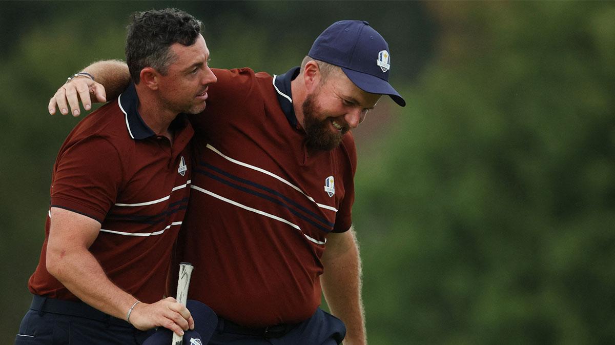 Europe's Shane Lowry celebrates with Rory McIlroy after winning the match on the 18th hole during the four-balls on the second day of competition for the Ryder Cup at Bethpage Black.