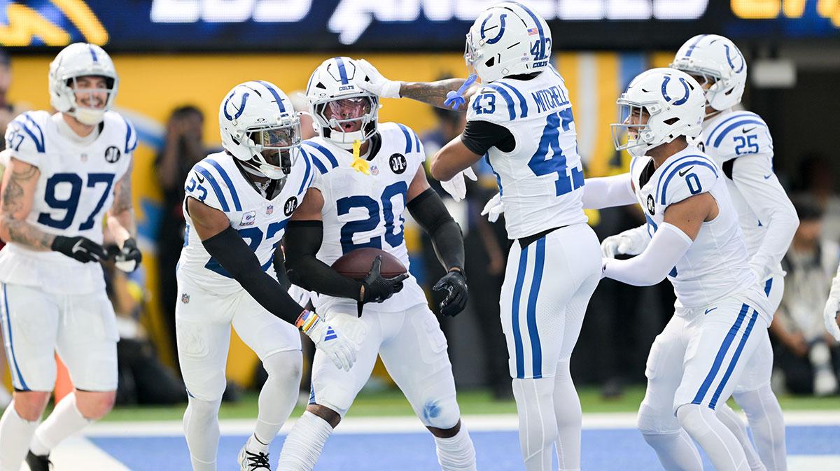 Indianapolis Colts safety Nick Cross (20) celebrates an interception in the first half against the Los Angeles Chargers at SoFi Stadium.