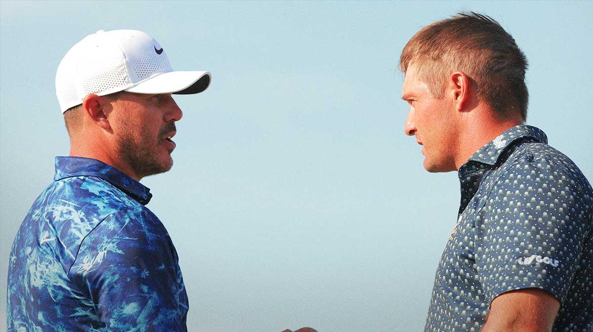 Bryson DeChambeau of the Crushers GC and Brooks Koepka of the Smash GC shake hands after the first round of the LIV Golf Chicago tournament