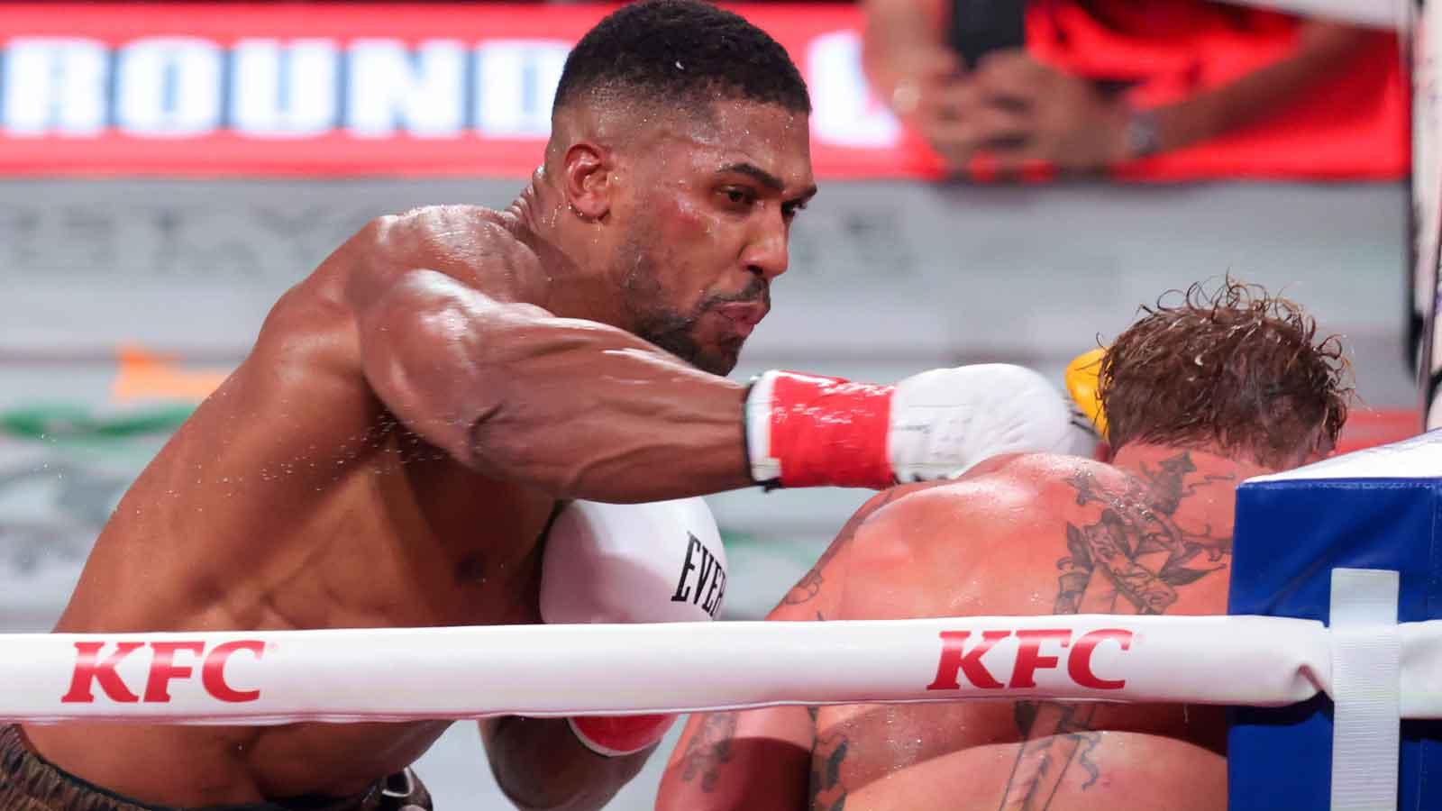 Anthony Joshua fights against Jake Paul during a heavyweight boxing bout at Kayesa Center.