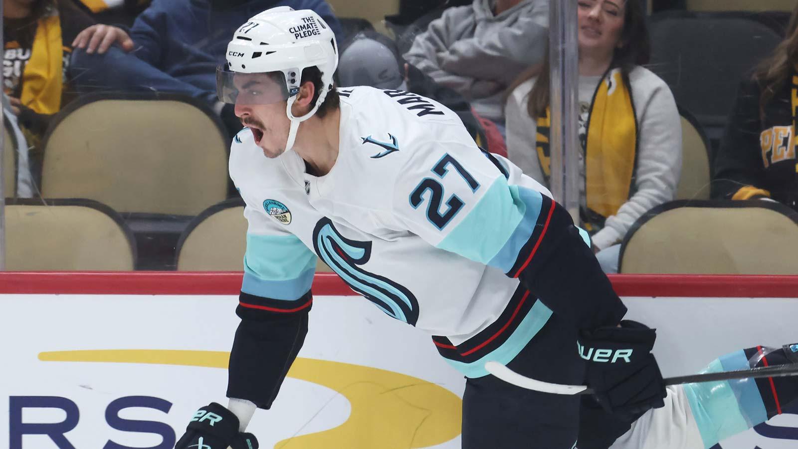 Seattle Kraken left wing Mason Marchment (27) shoots the puck against the Utah Mammoth during the third period at Delta Center.