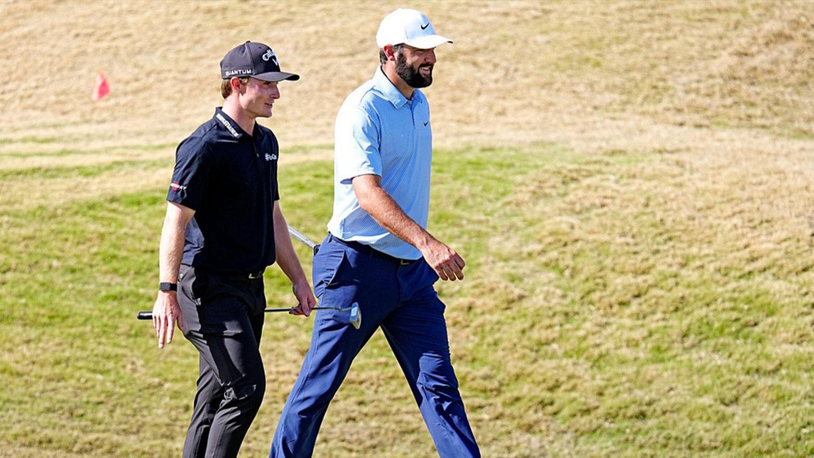 Blades Brown and Scottie Schefler talk during the final round of The American Express golf tournament at PGA West