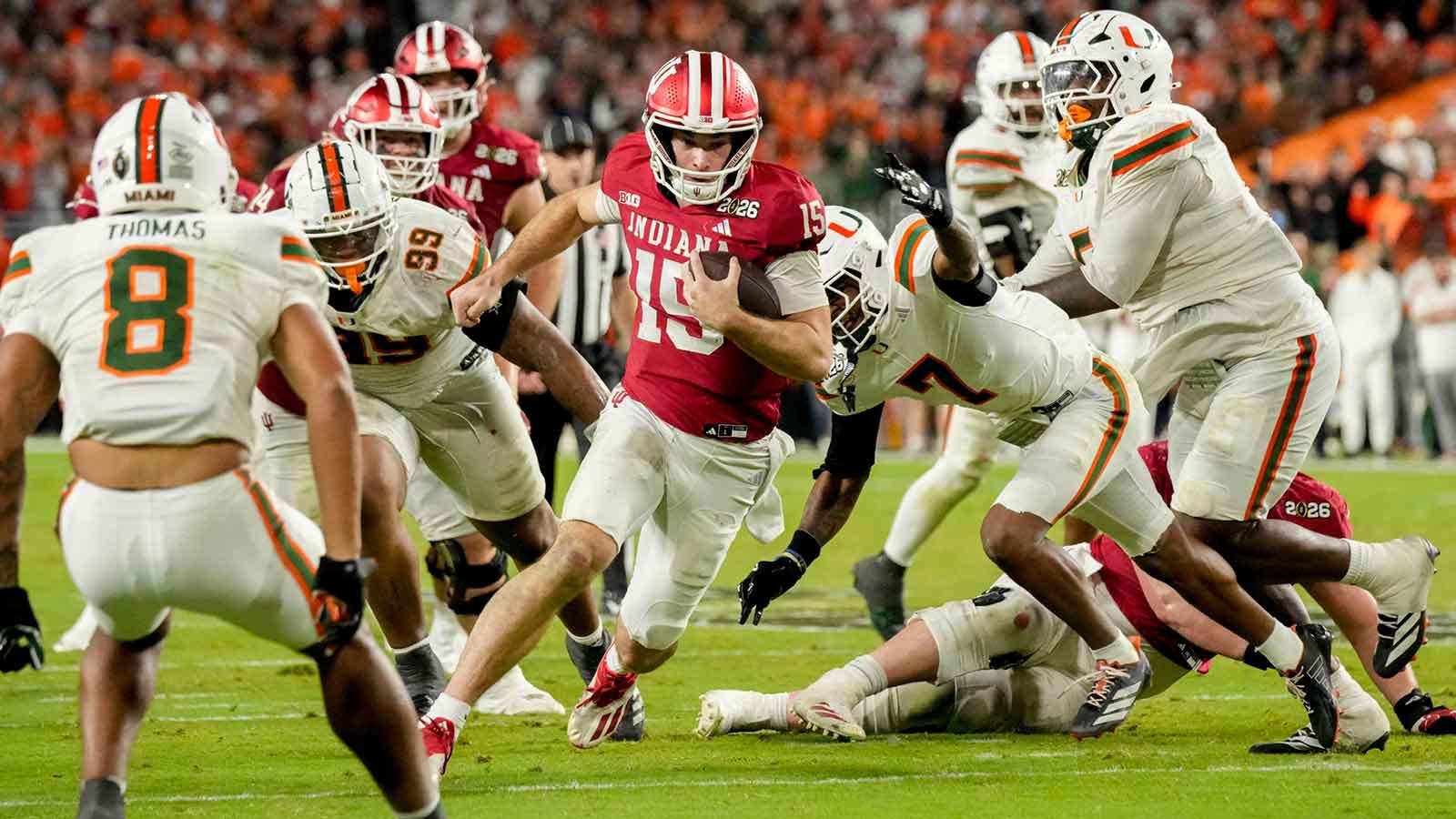 Indiana quarterback Fernando Mendoza (15) rushes into the end zone for a touchdown against Miami during the College Football Playoff national championship game at Hard Rock Stadium in Miami Gardens, Fla., on Jan. 19, 2026.