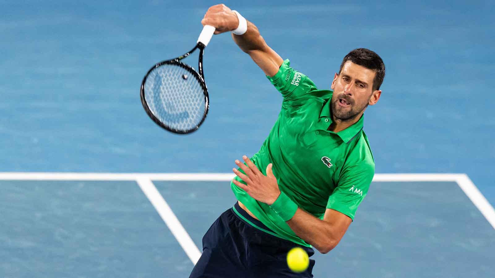 Jan 19, 2026; Melbourne, Victoria, Australia; Novak Djokovic of Serbia in action against Pedro Martinez of Spain in the first round of the men’s singles at the Australian Open at Rod Laver Arena in Melbourne Park. Mandatory Credit: Mike Frey-Imagn Images