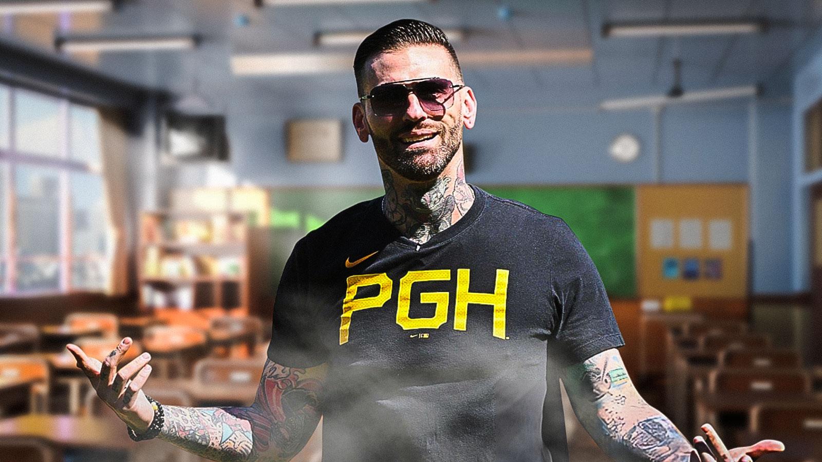 WWE commentator and college professor Corey Graves with classroom background.