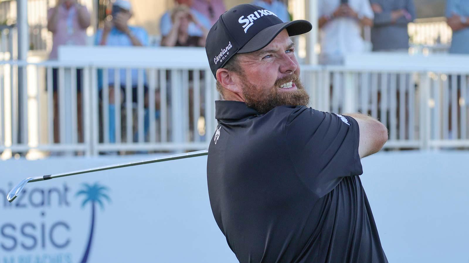 Shane Lowry watches his ball fly ball into the water on the 17th tee during the final round of the Cognizant Classic golf tournament.
